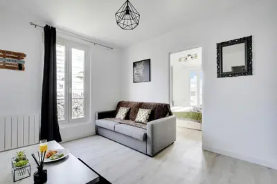 Coin salon dans l'établissement Appartement Suite 41 aux Portes de Paris