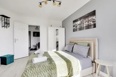 Un ou plusieurs lits dans un hébergement de l'établissement Appartement Suite 41 aux Portes de Paris