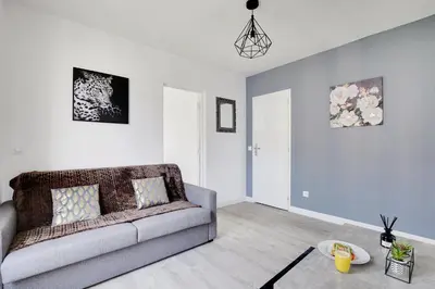 Coin salon dans l'établissement Appartement Suite 41 aux Portes de Paris