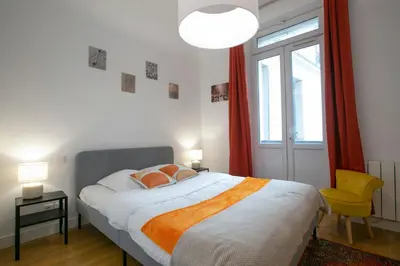 Un ou plusieurs lits dans un hébergement de l'établissement Warm 2 bedrooms apartement - c38