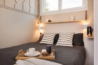 Un ou plusieurs lits dans un hébergement de l'établissement Amalfi - Studio et terrace à Auteuil