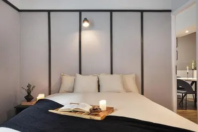 Un ou plusieurs lits dans un hébergement de l'établissement Loches - 1 chambre à Mouffetard