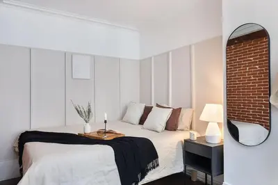 Un ou plusieurs lits dans un hébergement de l'établissement Angers - 1 chambre et balcon aux Halles