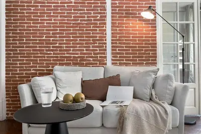 Coin salon dans l'établissement Angers - 1 chambre et balcon aux Halles