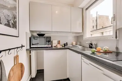 Cuisine ou kitchenette dans l'établissement Marini - Studio à Auteuil