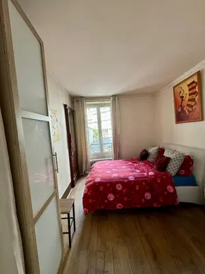 Un ou plusieurs lits dans un hébergement de l'établissement Paris - Appartement 50m2 - Tour Eiffel