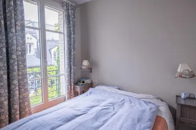 Un ou plusieurs lits dans un hébergement de l'établissement Amazing flat 3 bedrooms Notre Dame