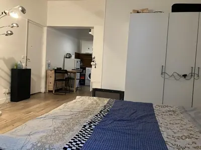 Un ou plusieurs lits dans un hébergement de l'établissement Appartement Cosy Paris 16 Saint Cloud
