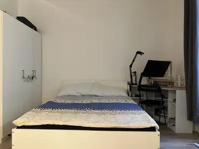 Un ou plusieurs lits dans un hébergement de l'établissement Appartement Cosy Paris 16 Saint Cloud