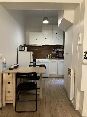 Cuisine ou kitchenette dans l'établissement Appartement Cosy Paris 16 Saint Cloud