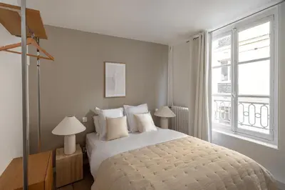 Un ou plusieurs lits dans un hébergement de l'établissement Appartement luxueux au cœur de Saint Germain des Prés