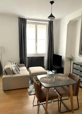Coin salon dans l'établissement Marais Modern & Spacious Studio