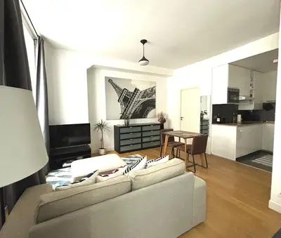 Télévision ou salle de divertissement dans l'établissement Marais Modern & Spacious Studio