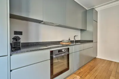 Cuisine ou kitchenette dans l'établissement GuestReady - Gateway to Parisian Delight