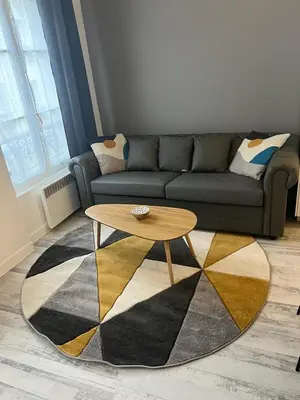 Coin salon dans l'établissement Montmartre Sacré Cœur Appartement Refait à Neuf Paris 18ème - 4 P