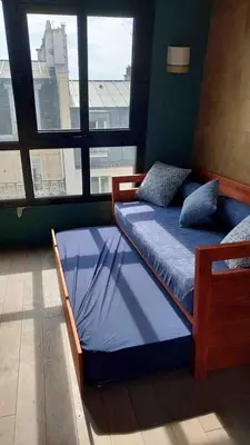 Un ou plusieurs lits dans un hébergement de l'établissement Paris Best view w/Rooftop!