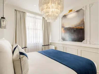 Un ou plusieurs lits dans un hébergement de l'établissement Merveil - Luxury Suite - Marais - Lenoir I