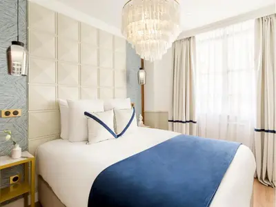 Un ou plusieurs lits dans un hébergement de l'établissement Merveil - Luxury Suite - Marais - Lenoir I