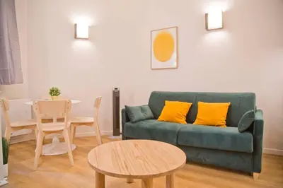 Coin salon dans l'établissement Luxury Apt Raspail Denfert