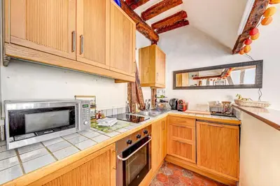 Cuisine ou kitchenette dans l'établissement Appartement charmant, atypique et central !