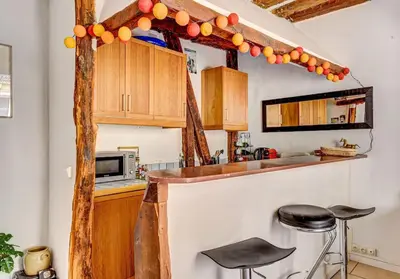 Cuisine ou kitchenette dans l'établissement Appartement charmant, atypique et central !