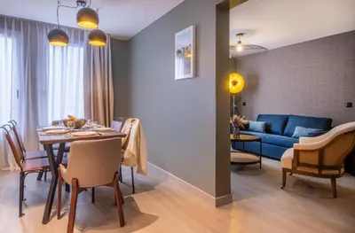 Coin salon dans l'établissement Appart'hôtel East Paris Suite