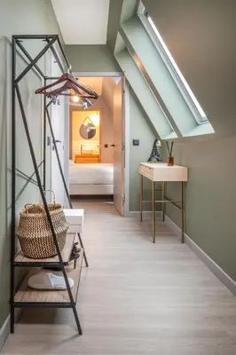 Un ou plusieurs lits dans un hébergement de l'établissement Appart'hôtel East Paris Suite
