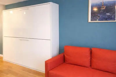 Coin salon dans l'établissement Parisian Charm Studio - Ideal Stay for 3 Guests