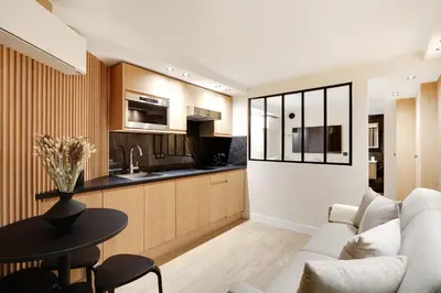 Cuisine ou kitchenette dans l'établissement Pick A Flat's Apartment in Odeon - Rue Saint André des Arts
