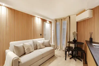 Coin salon dans l'établissement Pick A Flat's Apartment in Odeon - Rue Saint André des Arts