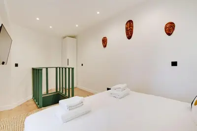 Un ou plusieurs lits dans un hébergement de l'établissement Place d'Italie Modern & Renovated 3BD for 10guests