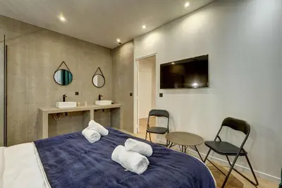 Un ou plusieurs lits dans un hébergement de l'établissement Modern and renovated apartment next to Sacré-Coeur