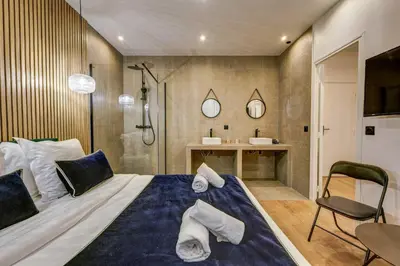 Un ou plusieurs lits dans un hébergement de l'établissement Modern and renovated apartment next to Sacré-Coeur