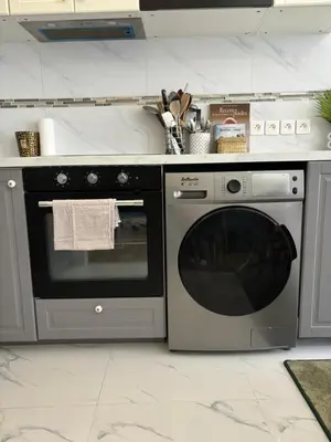 Cuisine ou kitchenette dans l'établissement Superbe appartement Paris 3ème