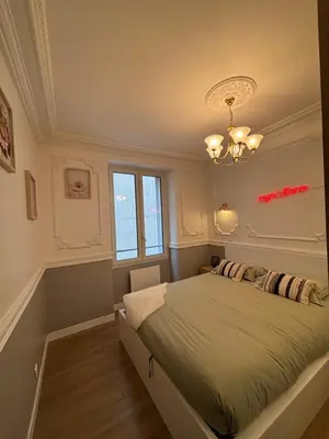 Un ou plusieurs lits dans un hébergement de l'établissement Superbe appartement Paris 3ème