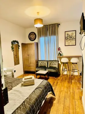 Un ou plusieurs lits dans un hébergement de l'établissement Paris flat,Place d la République