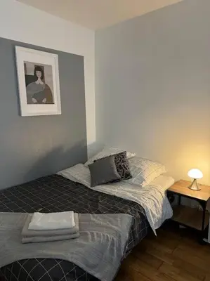 Un ou plusieurs lits dans un hébergement de l'établissement Paris flat,Place d la République