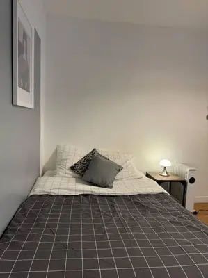 Un ou plusieurs lits dans un hébergement de l'établissement Paris flat,Place d la République