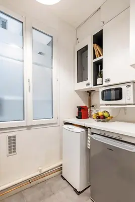 Cuisine ou kitchenette dans l'établissement Spacious bright apartment in Montmartre Paris