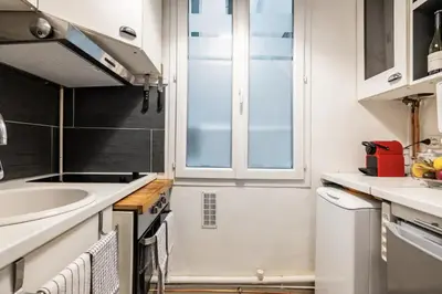 Cuisine ou kitchenette dans l'établissement Spacious bright apartment in Montmartre Paris