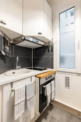 Cuisine ou kitchenette dans l'établissement Spacious bright apartment in Montmartre Paris