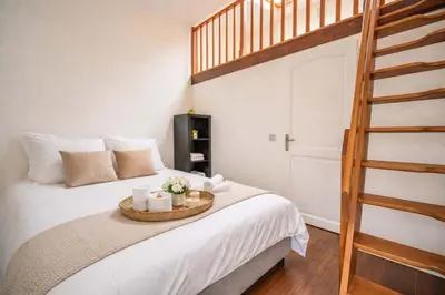 Un ou plusieurs lits dans un hébergement de l'établissement Le Duplex Cœur de Montmartre # Confort et Charme - Proche Sacré-Coeur