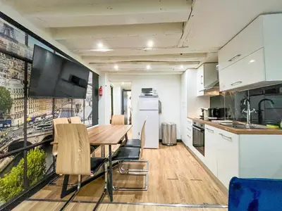 Cuisine ou kitchenette dans l'établissement Urban Flat 174 - Vuitton St Denis