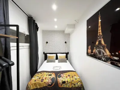 Un ou plusieurs lits dans un hébergement de l'établissement Urban Flat 175 - Loft St Denis