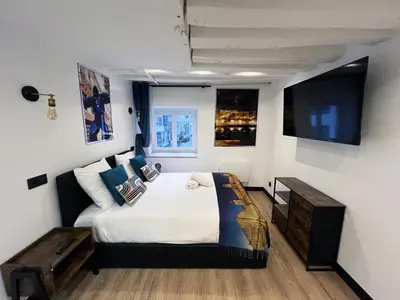 Télévision ou salle de divertissement dans l'établissement Urban Flat 175 - Loft St Denis
