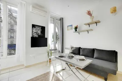 Coin salon dans l'établissement Cozy apartment - 1BR-3P - Gare du Nord