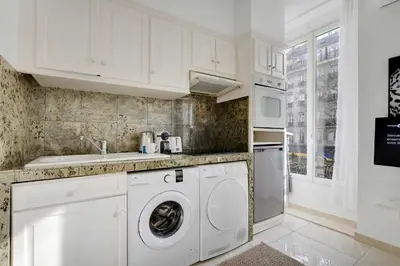 Cuisine ou kitchenette dans l'établissement Cozy apartment - 1BR-3P - Gare du Nord