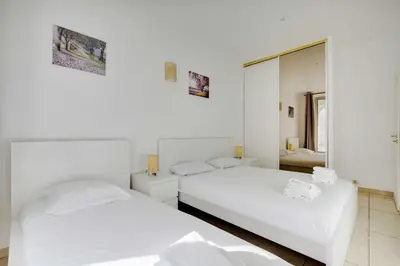 Un ou plusieurs lits dans un hébergement de l'établissement Cozy apartment - 1BR-3P - Gare du Nord
