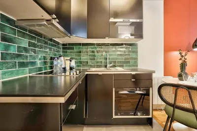 Cuisine ou kitchenette dans l'établissement Cocon au coeur de Montorgueil