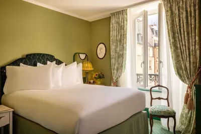 Un ou plusieurs lits dans un hébergement de l'établissement UNE AUTRE CHAMBRE